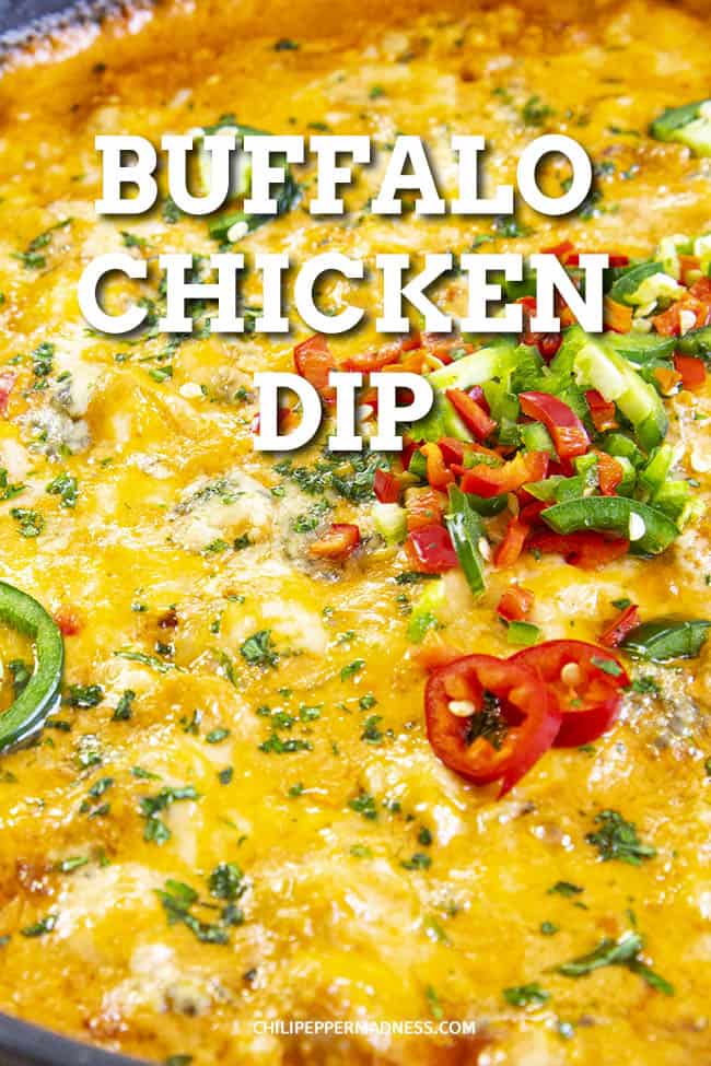 Spicy Buffalo Chicken Dip Recipe - A classic Buffalo chicken dip recipe made with three cheeses, tender simmered chicken, Buffalo sauce, plenty of spices and three types of spicy chili peppers. This is the best buffalo chicken dip I have EVER tasted. #Spicy #ChickenDip #BuffaloDip #Appetizer #PartyFood #GameDayFood #Tailgaiting #Cheese #Habaneros #Jalapenos
