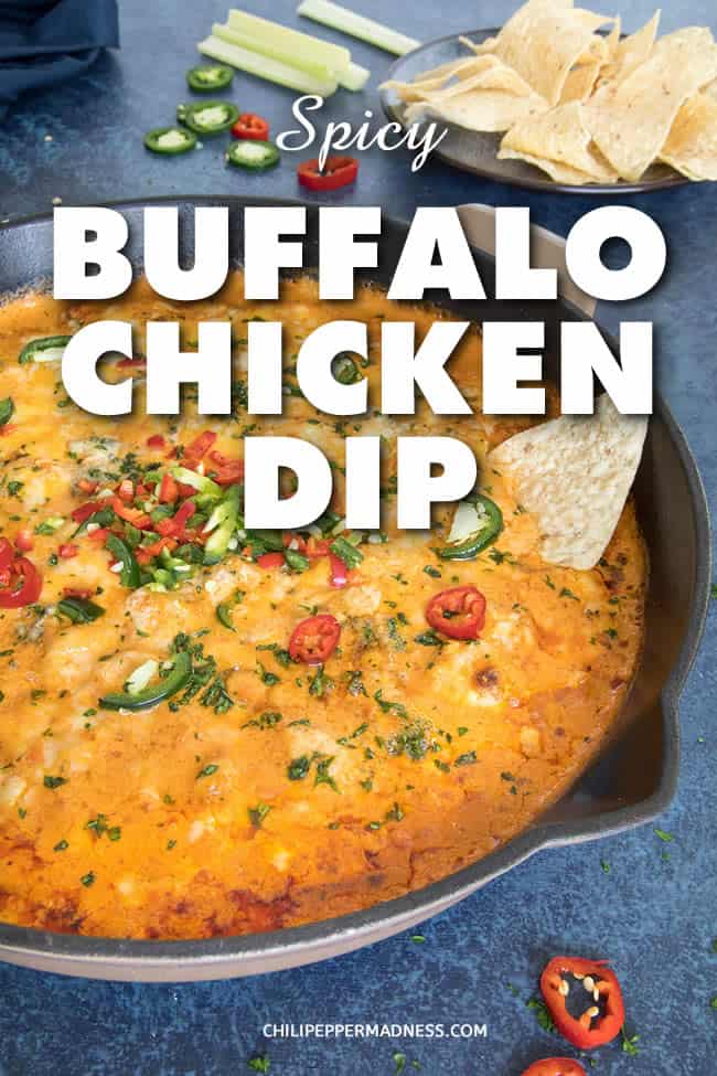 Spicy Buffalo Chicken Dip Recipe - A classic Buffalo chicken dip recipe made with three cheeses, tender simmered chicken, Buffalo sauce, plenty of spices and three types of spicy chili peppers. This is the best buffalo chicken dip I have EVER tasted. #Spicy #ChickenDip #BuffaloDip #Appetizer #PartyFood #GameDayFood #Tailgaiting #Cheese #Habaneros #Jalapenos