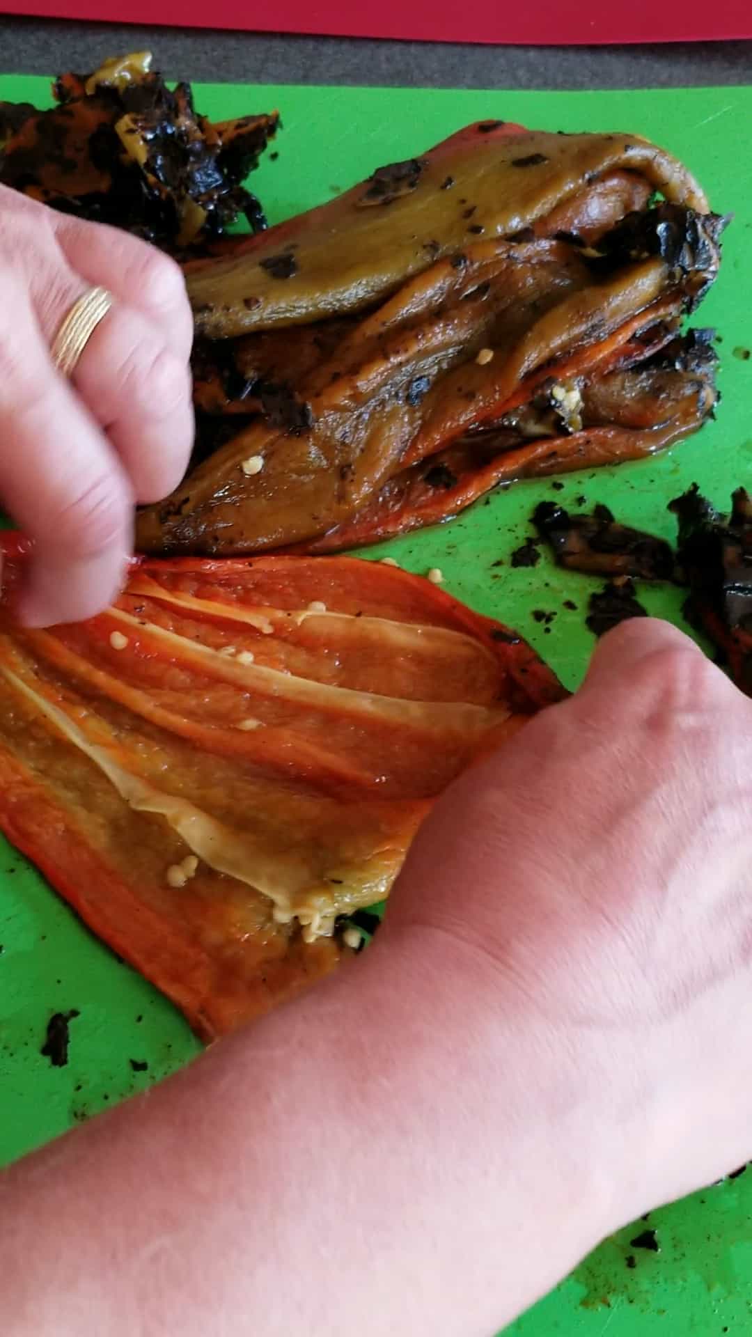 Removing the innards from my roasted red Hatch peppers.