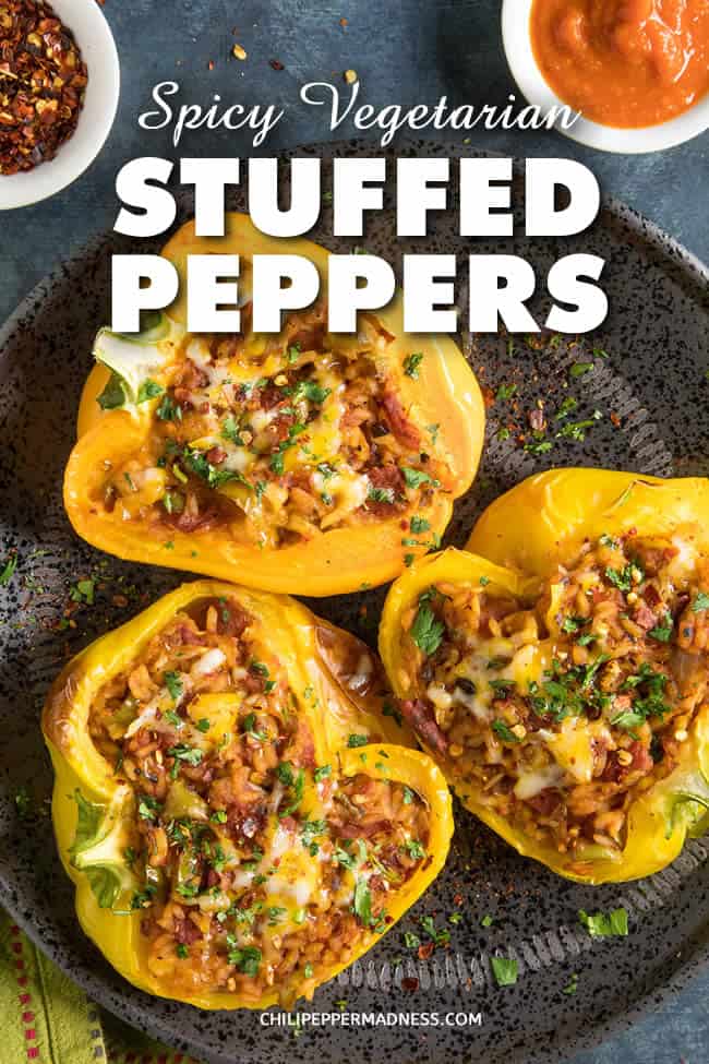 Spicy Vegetarian Stuffed Peppers - A vegetarian recipe for sweet bell peppers stuffed with spicy rice and cheese, baked, then topped with your favorite hot sauce. These are cheesy and hearty and just the right amount of spicy. Easy to freeze. #stuffedpeppers #vegetarian #peppers #stuffed #dinner