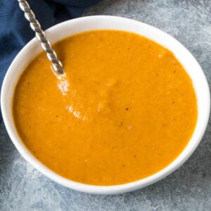 Roasted Red Hatch Chile Sauce in a big white bowl.
