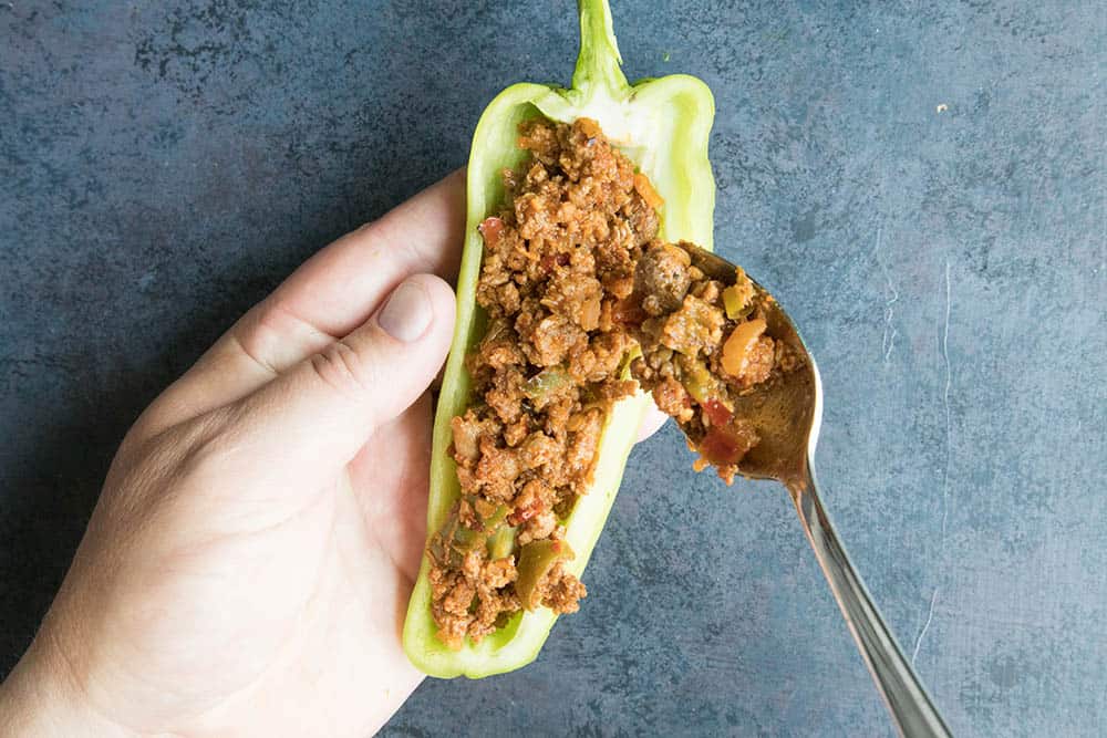 Filling the Cubanelle Peppers with our turkey stuffing mixture