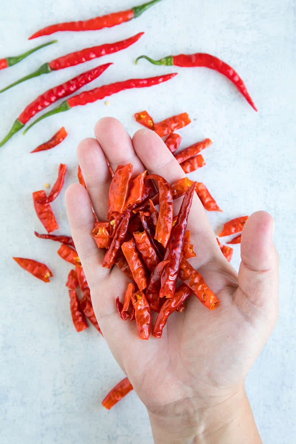 Holding Dried Cayenne Peppers in a hand.