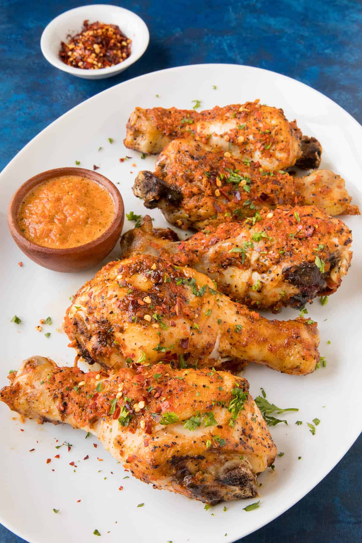 Peri Peri Chicken Legs - Plated and ready to eat