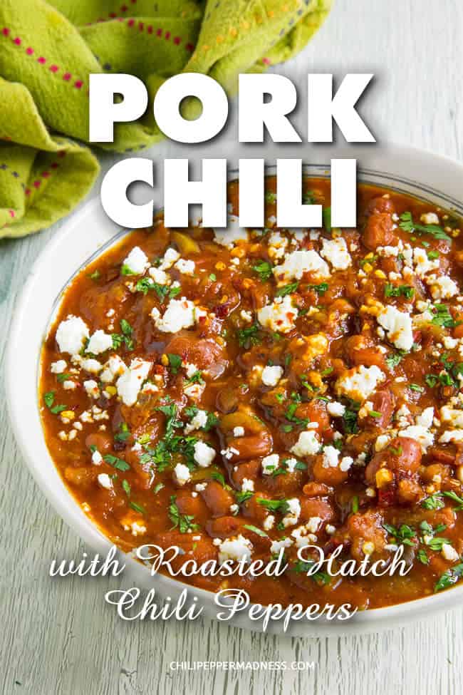 Pork Chili with Roasted Red Hatch Peppers - This pork chili recipe is made with chunks of tender pork shoulder, roasted red New Mexican peppers, fire roasted tomatoes and a mix of chili powders that are huge on flavor. Grab a bowl! Perfect for game day. #dinner #Chili #OnePot #Spicy #HatchPeppers #PorkChili #PorkShoulder