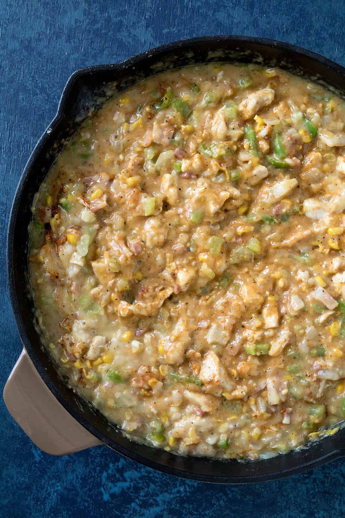 Stir the cheese into the Cajun Chicken Casserole.