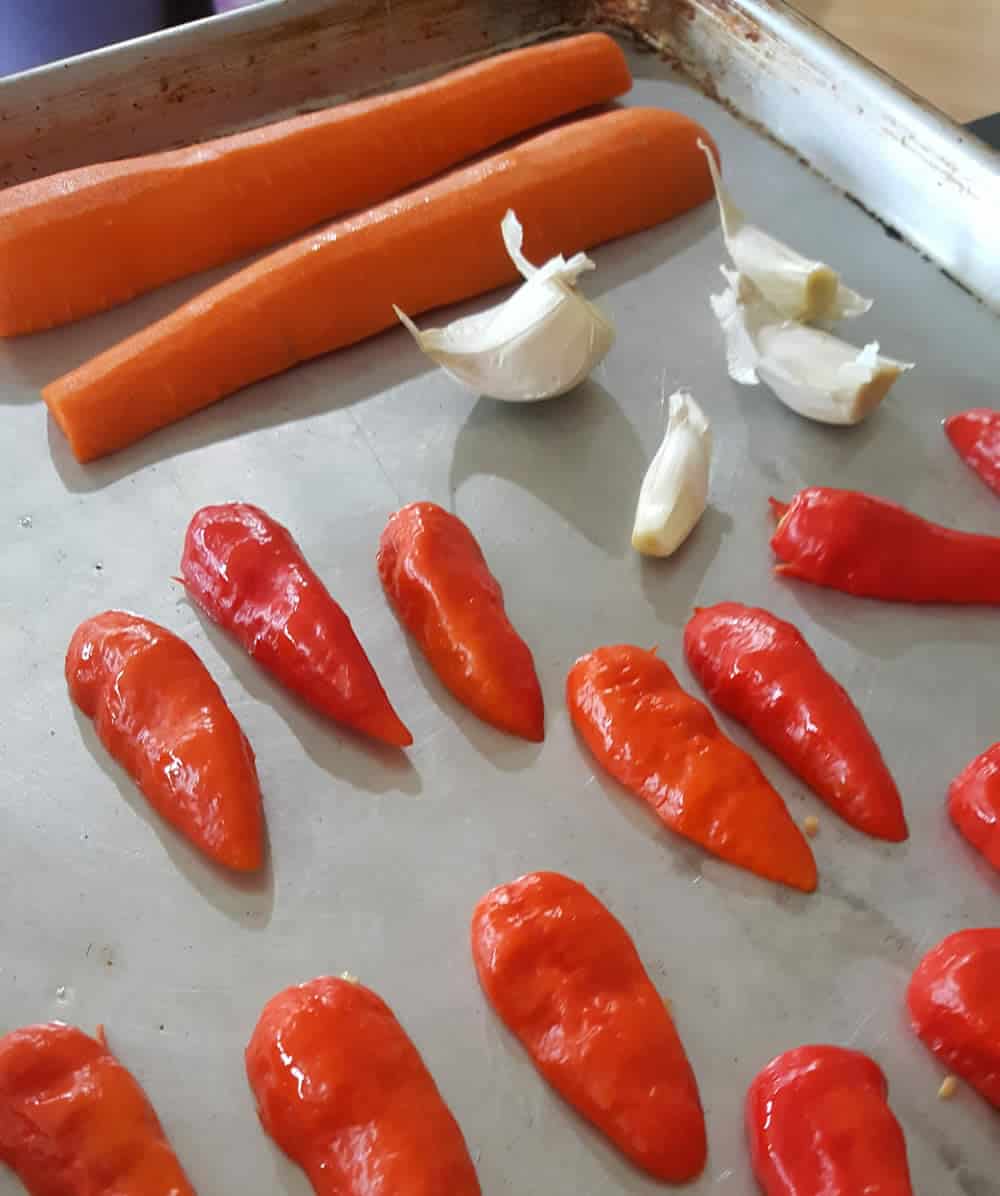 Roasting the Carrots, Ghost Peppers and Garlic.