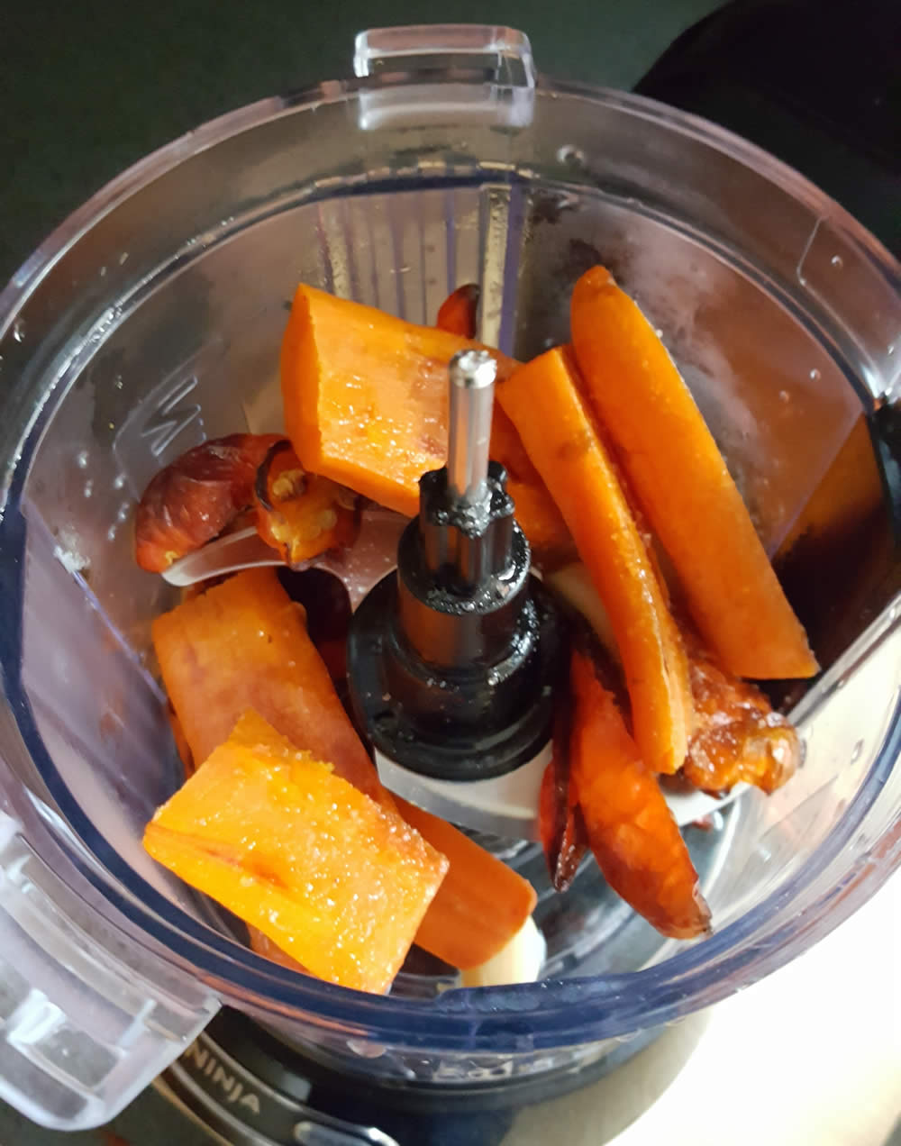 Roasted carrots, garlic and ghost peppers, ready to make sauce.