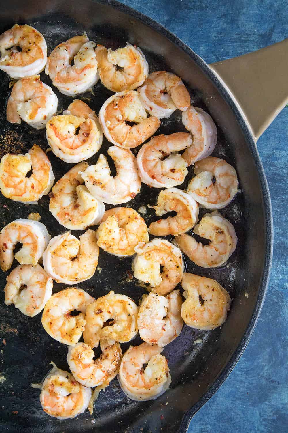 Seared Shrimp in a skillet.