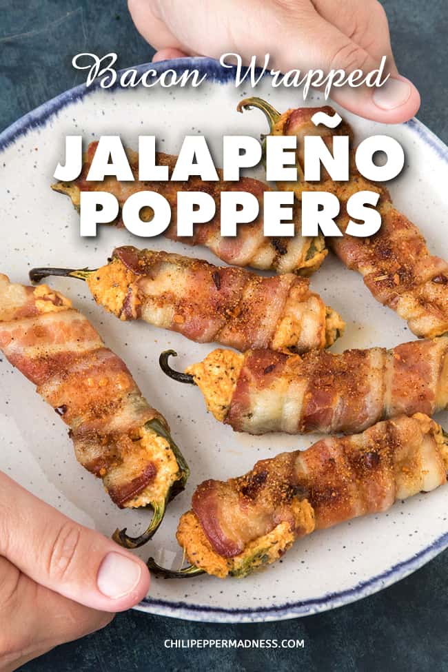 Bacon Wrapped Jalapeno Poppers - These spicy bacon wrapped jalapeno poppers are filled with melty cheese and loads of spices. They're the perfect party appetizer recipe. Watch them disappear! #Appetizer #JalapenoPoppers