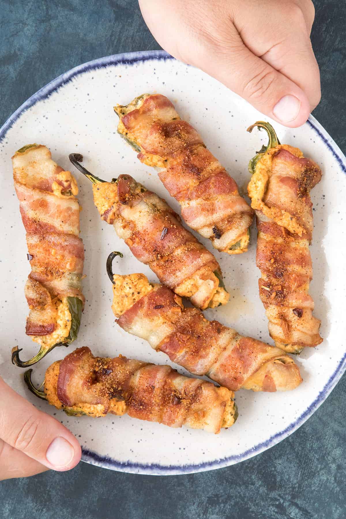 Bacon Wrapped Jalapeno Poppers - On a plate, ready to serve
