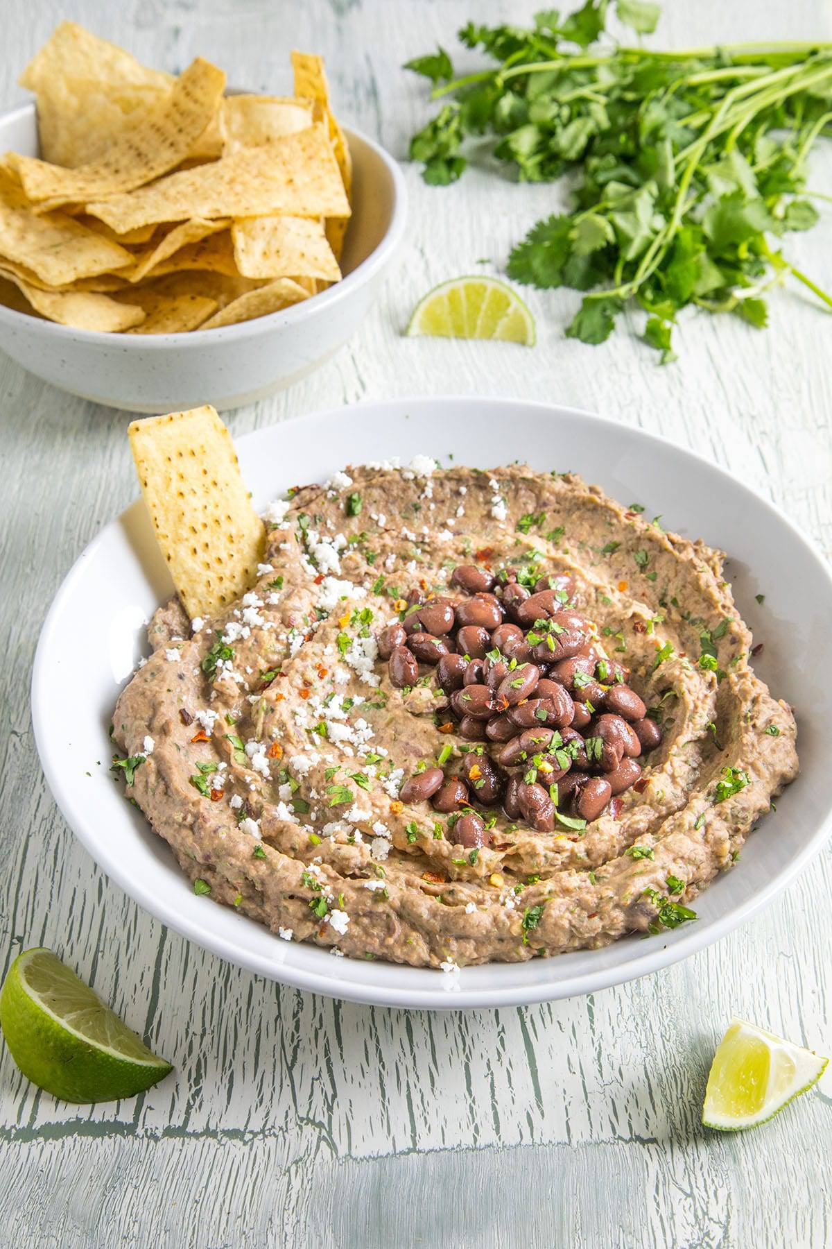 Black Bean Dip, in a bowl with chips.