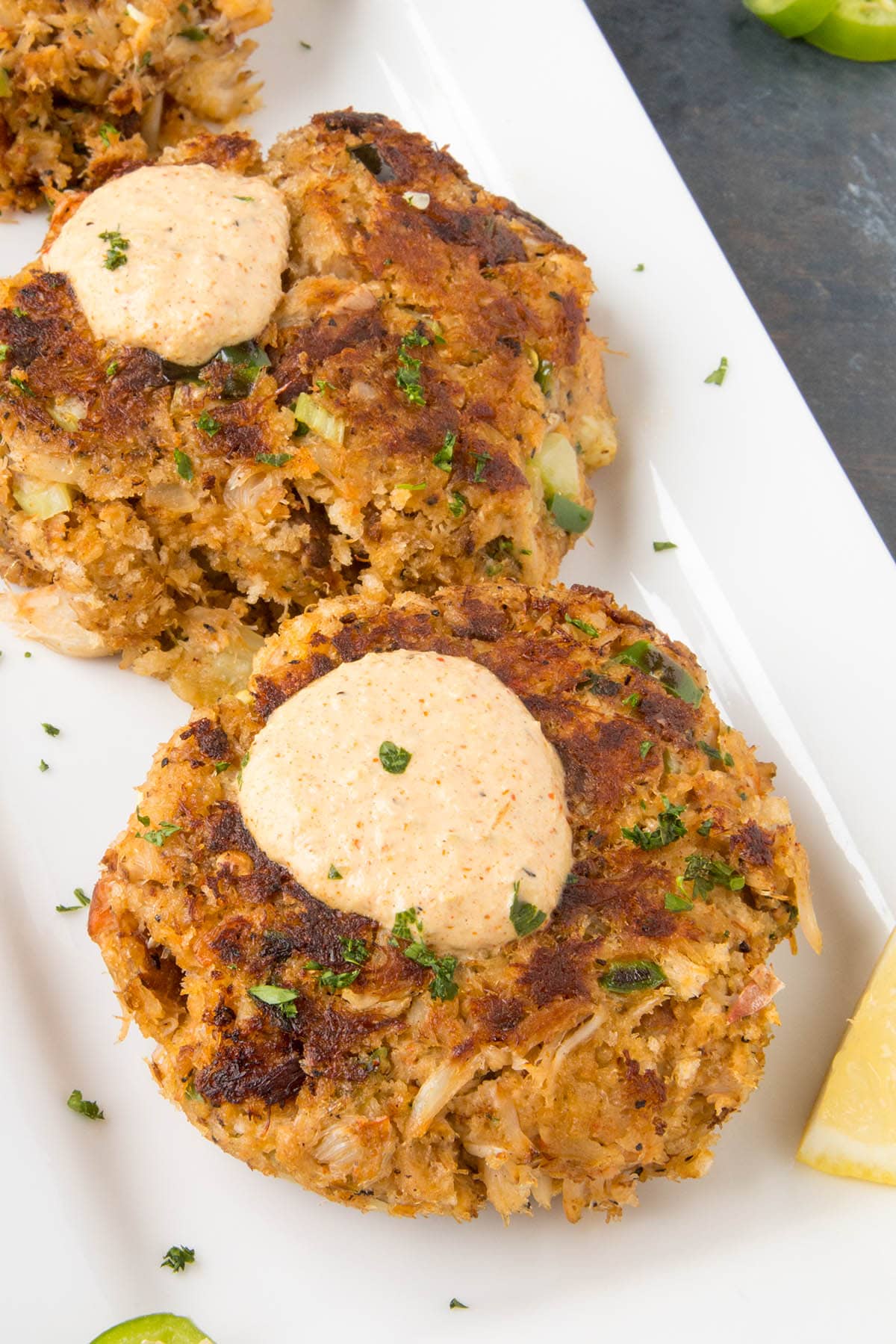 Crab Cakes with Cajun Cream Sauce - On a plate, ready to Serve