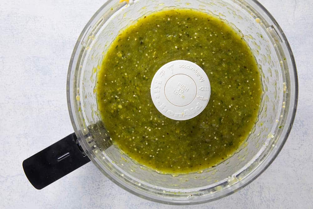 Verde sauce in a blender, ready for cooking