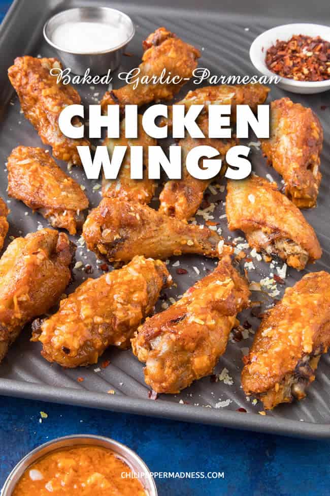 Baked Garlic-Parmesan Chicken Wings - A recipe for crispy baked chicken wings tossed with a homemade garlic-parmesan sauce that you can make in minutes. It's always time for chicken wings. #ChickenWings #Appetizer