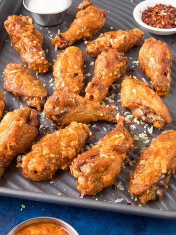 Buffalo Garlic Parmesan Chicken Wings looking extra delicious.