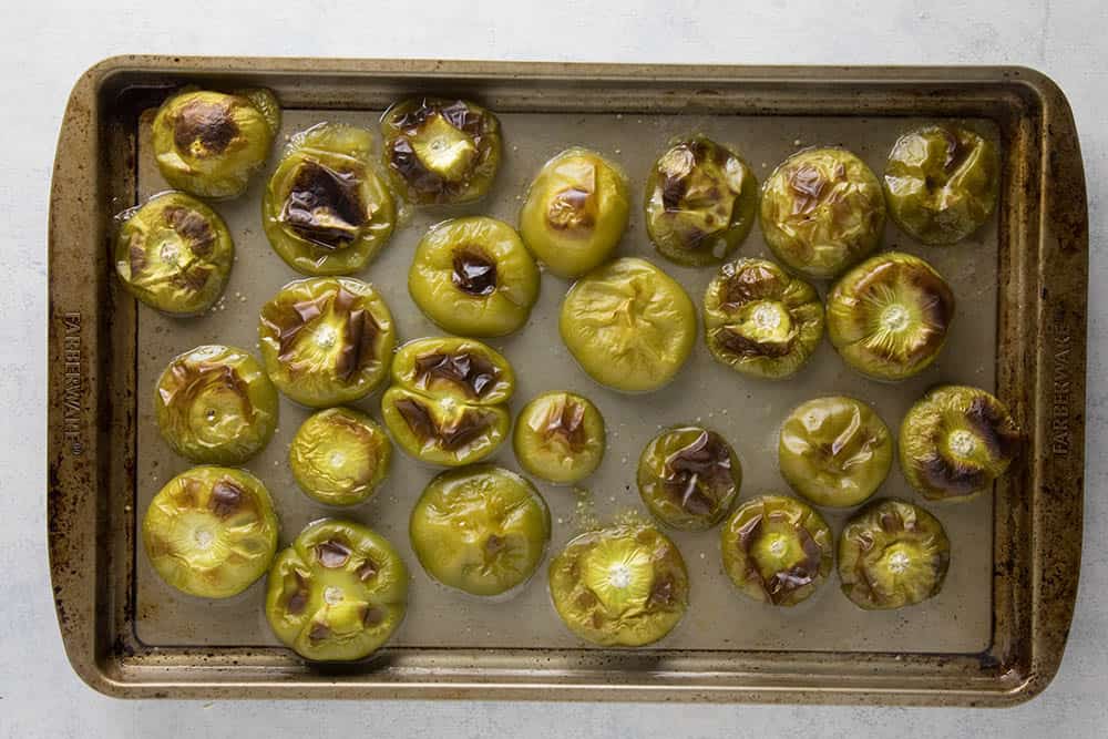 Roasted tomatillos on a pan