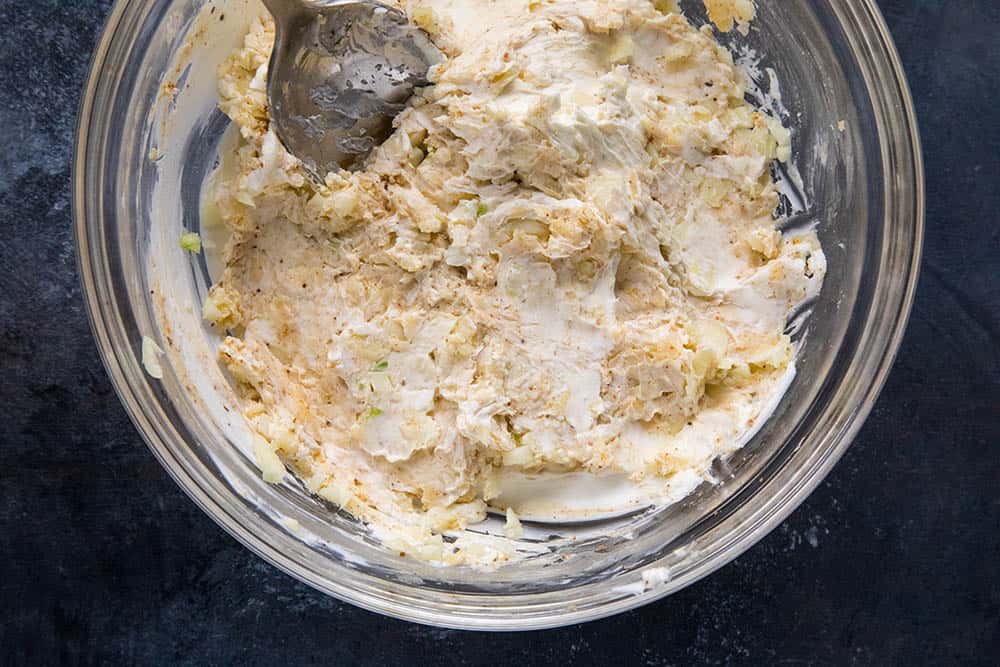 Preparing Cajun Cream Cheese Stuffing