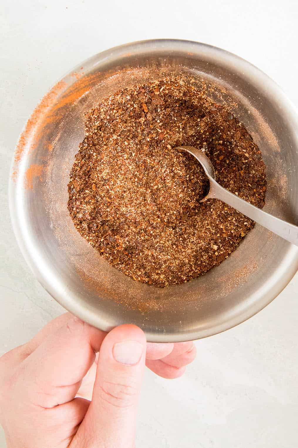 Mixing the Homemade Chili Powder in a bowl