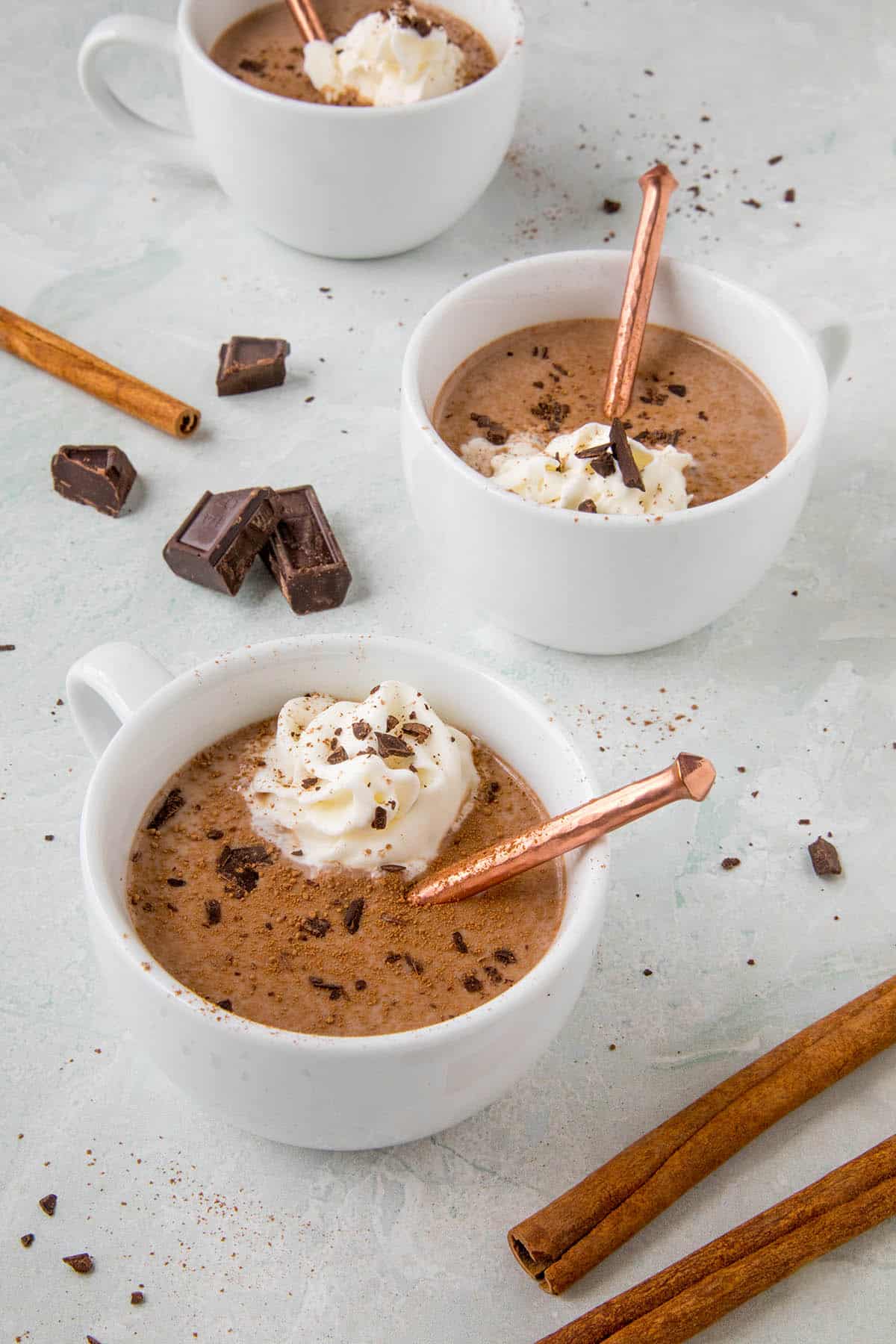 Mexican Hot Chocolate in a cup, ready to serve, with whipped cream