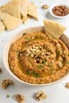 Muhammara Recipe (Roasted Red Pepper & Walnut Dip), in a bowl, ready to serve