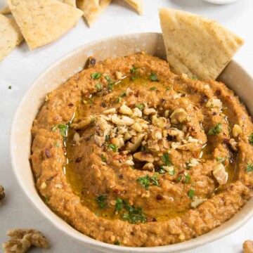 Muhammara Recipe (Roasted Red Pepper & Walnut Dip), in a bowl, ready to serve