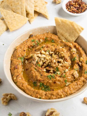 Muhammara Recipe (Roasted Red Pepper & Walnut Dip), in a bowl, ready to serve