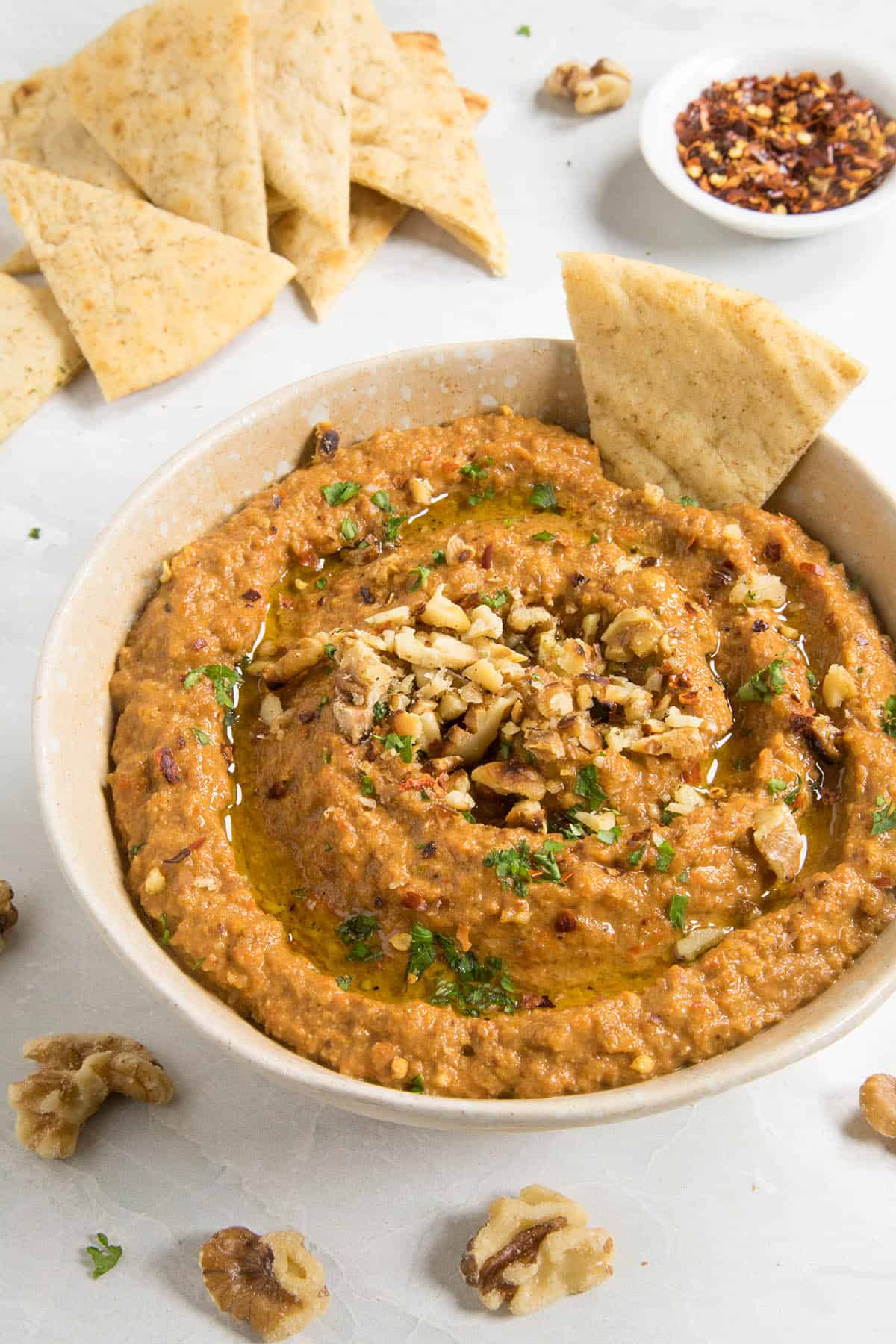 Muhammara Recipe (Roasted Red Pepper & Walnut Dip), in a bowl, ready to serve