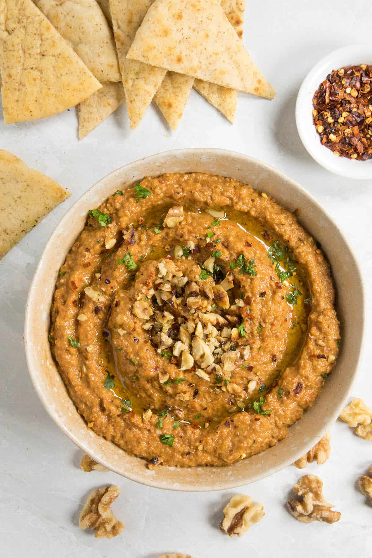 Muhammara Recipe (Roasted Red Pepper & Walnut Dip), in a bowl, ready to serve