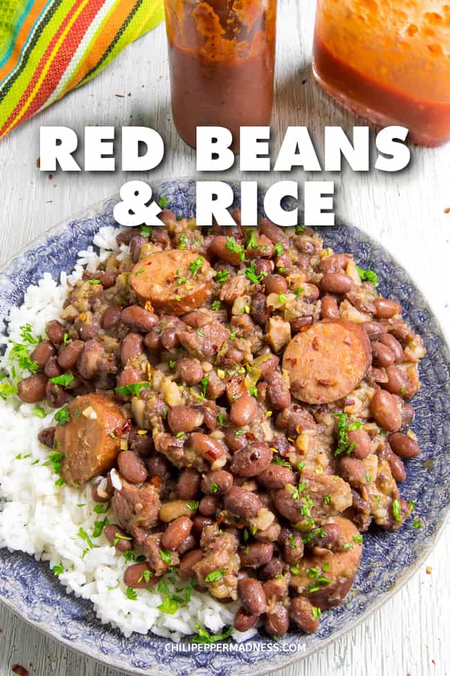 Cajun Red Beans and Rice with Andouille - Red Beans and Rice is a classic Cajun comfort food recipe, with perfectly spiced beans simmered slowly in a pot with smoked andouille sausage, onions, bell peppers and celery, served up with rice for surprisingly complex flavor. #Cajun #Dinner