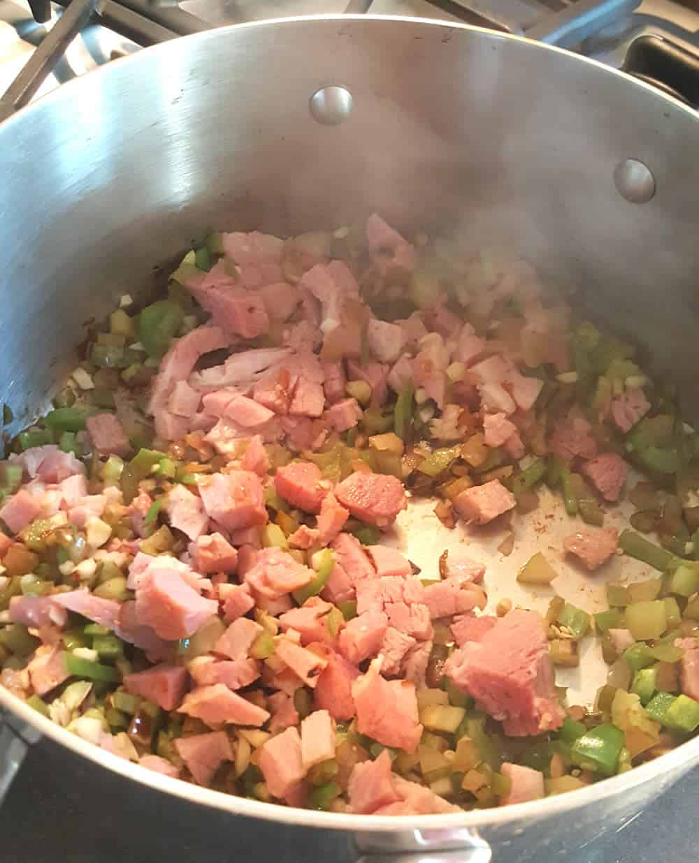Ham added to the pot to make our Red Beans and Rice - Recipe