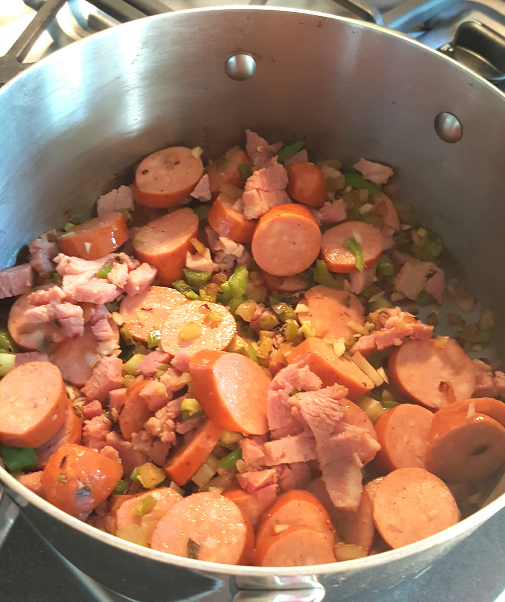 Andouille added to the pot to make our Red Beans and Rice - Recipe