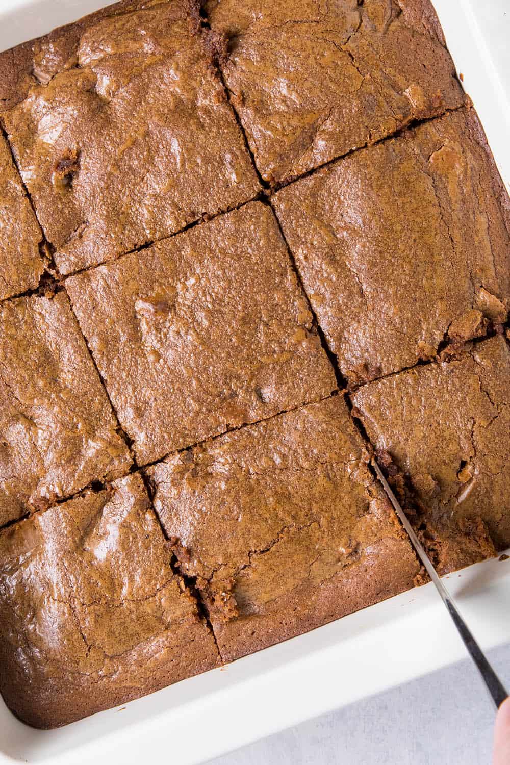 Slicing our Mexican Brownies with a knife