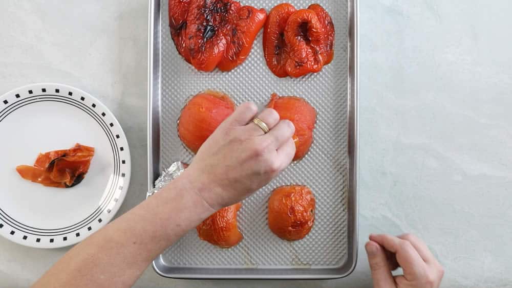Peeling roasted tomatoes and peppers