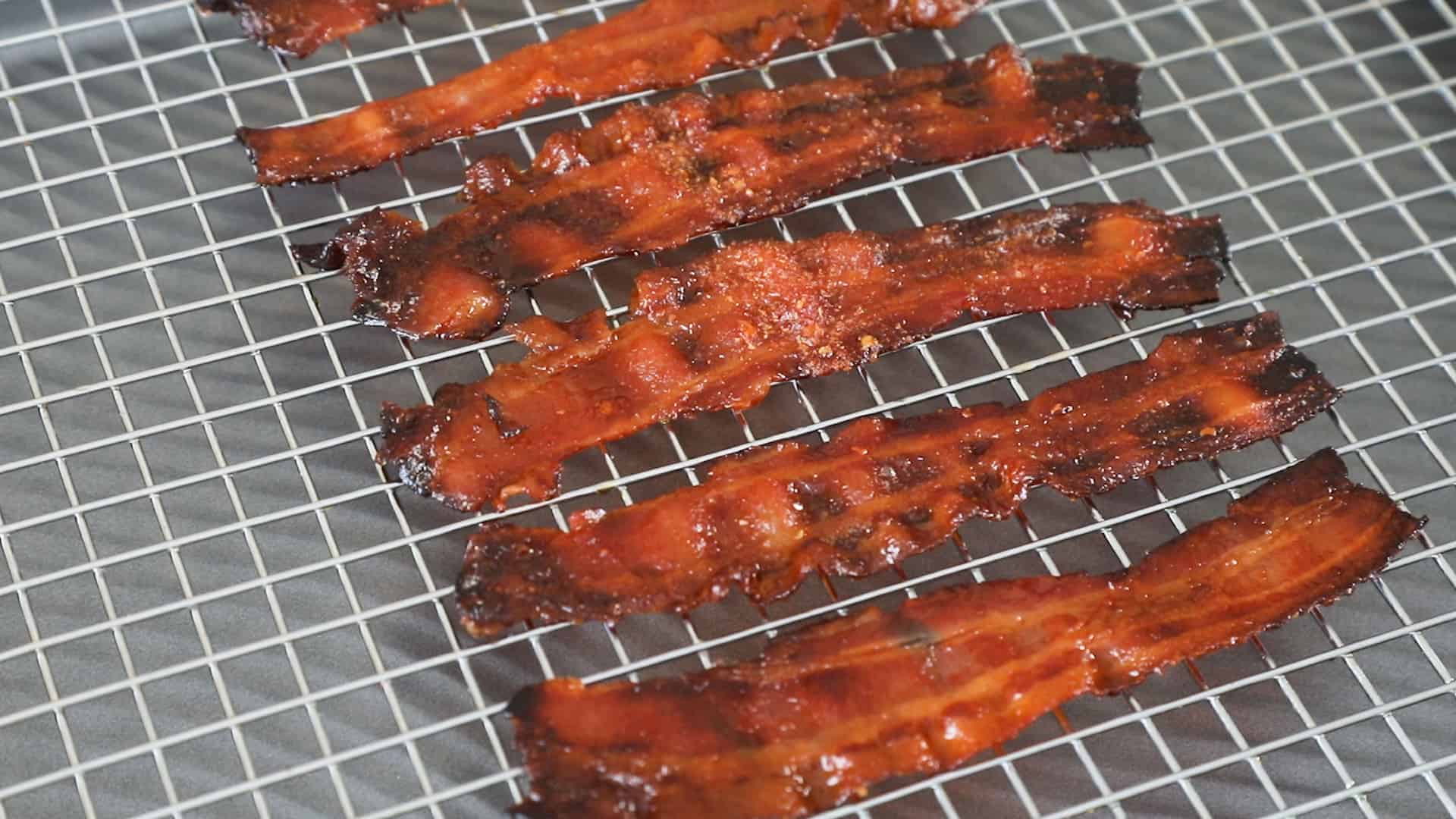 Sweet and Spicy Ghost Pepper Candied Bacon - Recipe Ghost Pepper Candied Bacon - On a cooling rack