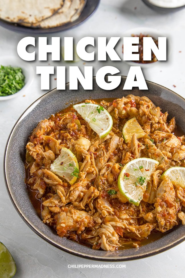 Chicken Tinga (Spicy Chipotle Shredded Chicken) - Chicken Tinga is a recipe for juicy shredded chicken slowly simmered in a zesty tomato-chipotle sauce. Serve it as tacos, tostadas, burritos, or tortas. Very easy to prepare. #MexicanCuisine #ChickenDinner #Spicy