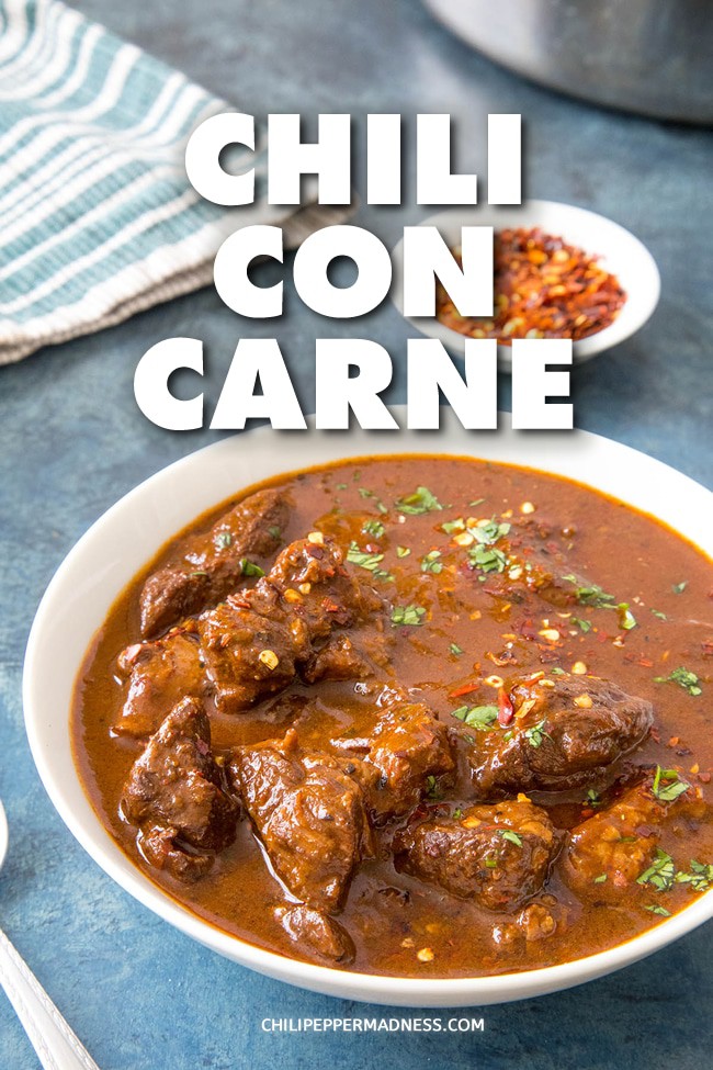 Chili Con Carne - A recipe for rich and authentic chili con carne, a spicy stew of beef and chilies, including ancho, guajillo and jalapeno, and many wonderful seasonings. Make it with or without beans. #chili #Dinner #Spicy