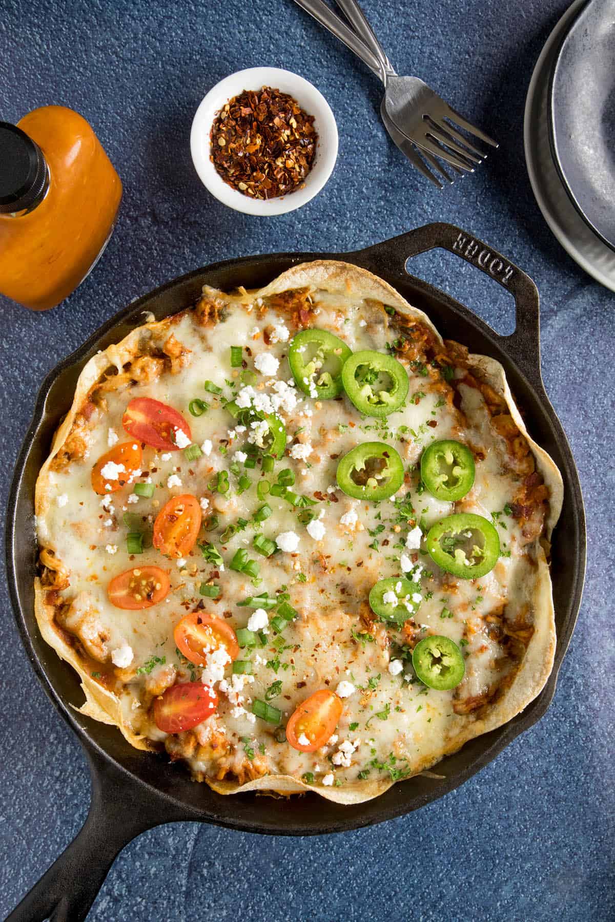 Chipotle Chicken Enchilada Casserole in a pan, ready to eat