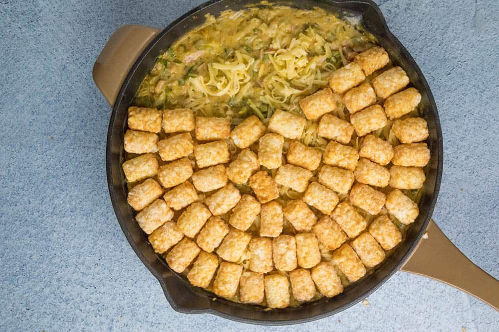 Cajun Ham and Turkey Tater Tot Casserole, in a pan, just before baking