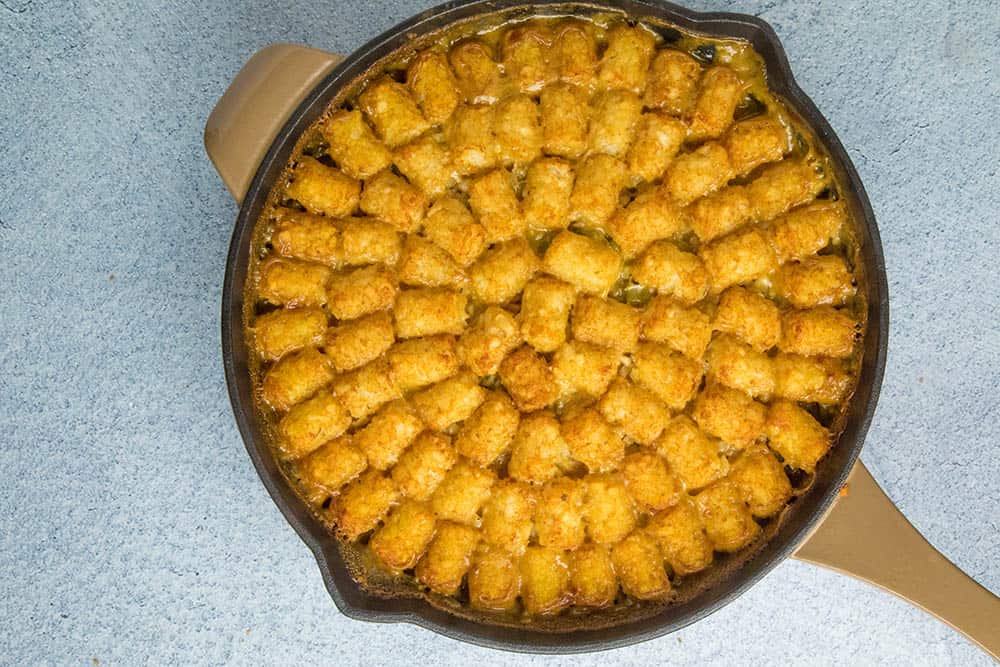 Cajun Ham and Turkey Tater Tot Casserole, in a pan, ready to serve