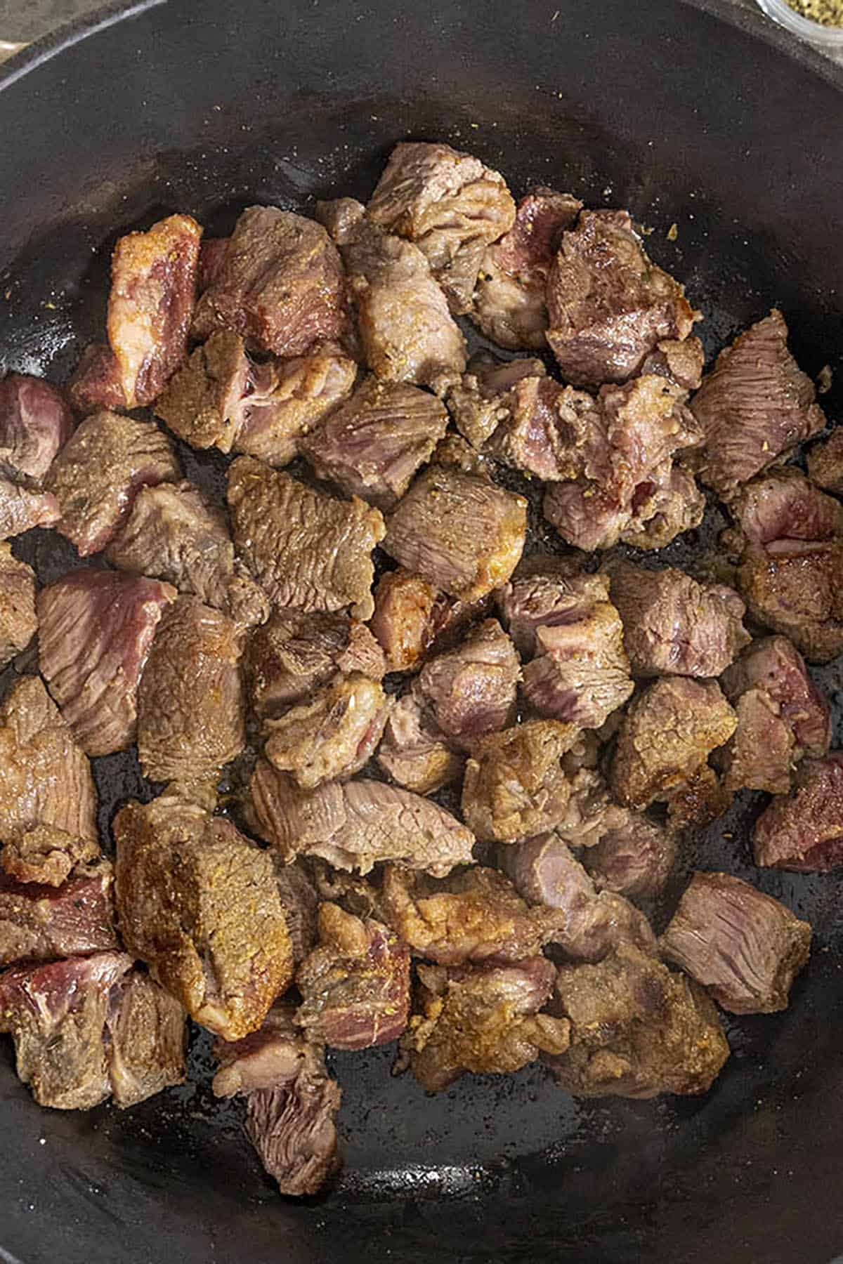 Searing the beef to make beef chili