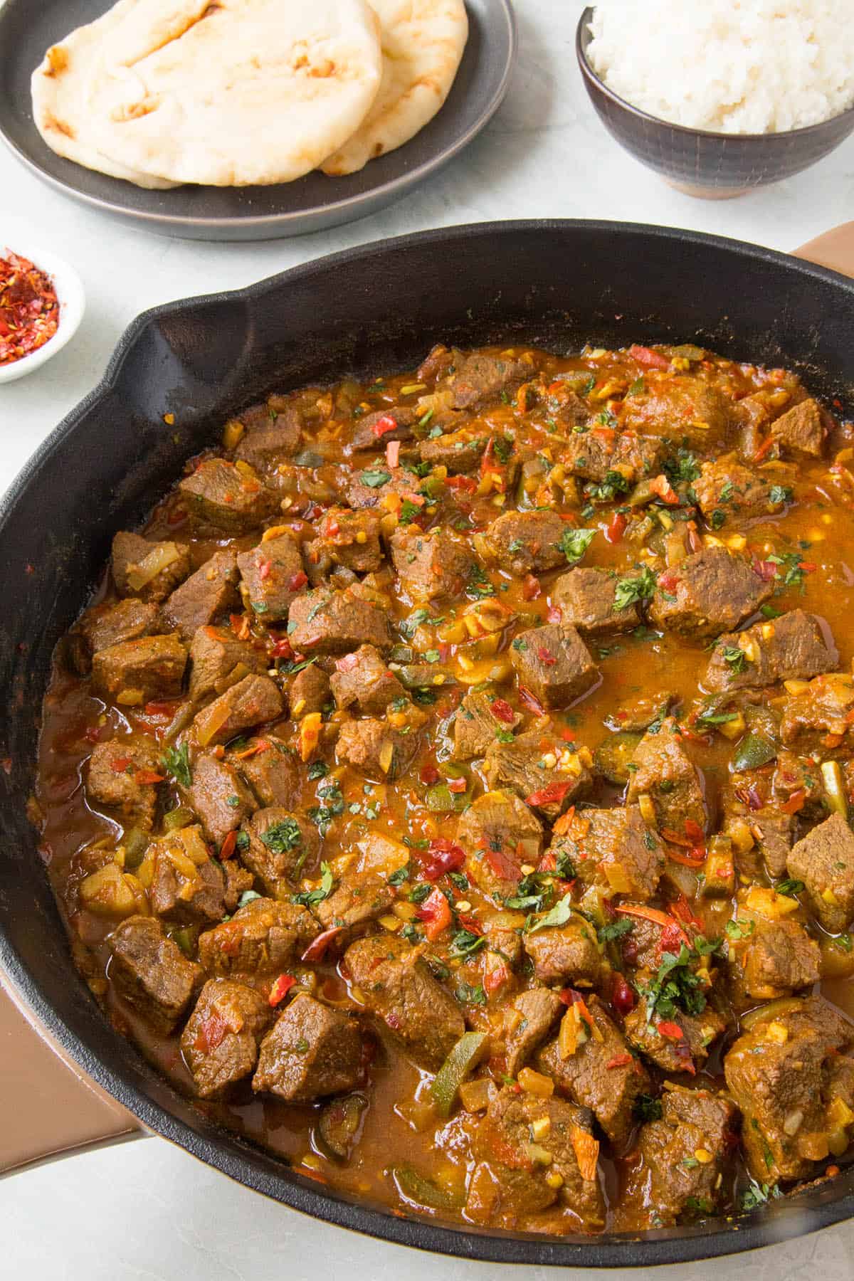 Beef Vindaloo, in a pan with extra spices