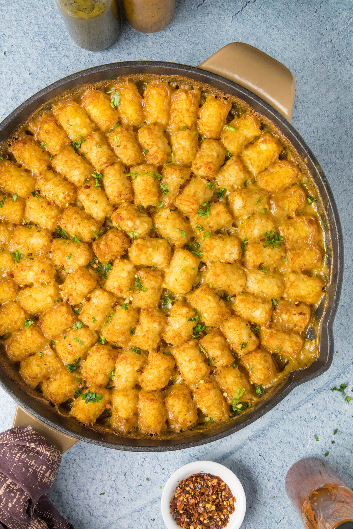 Cajun Ham and Turkey Tater Tot Casserole, in a pan, ready to serve