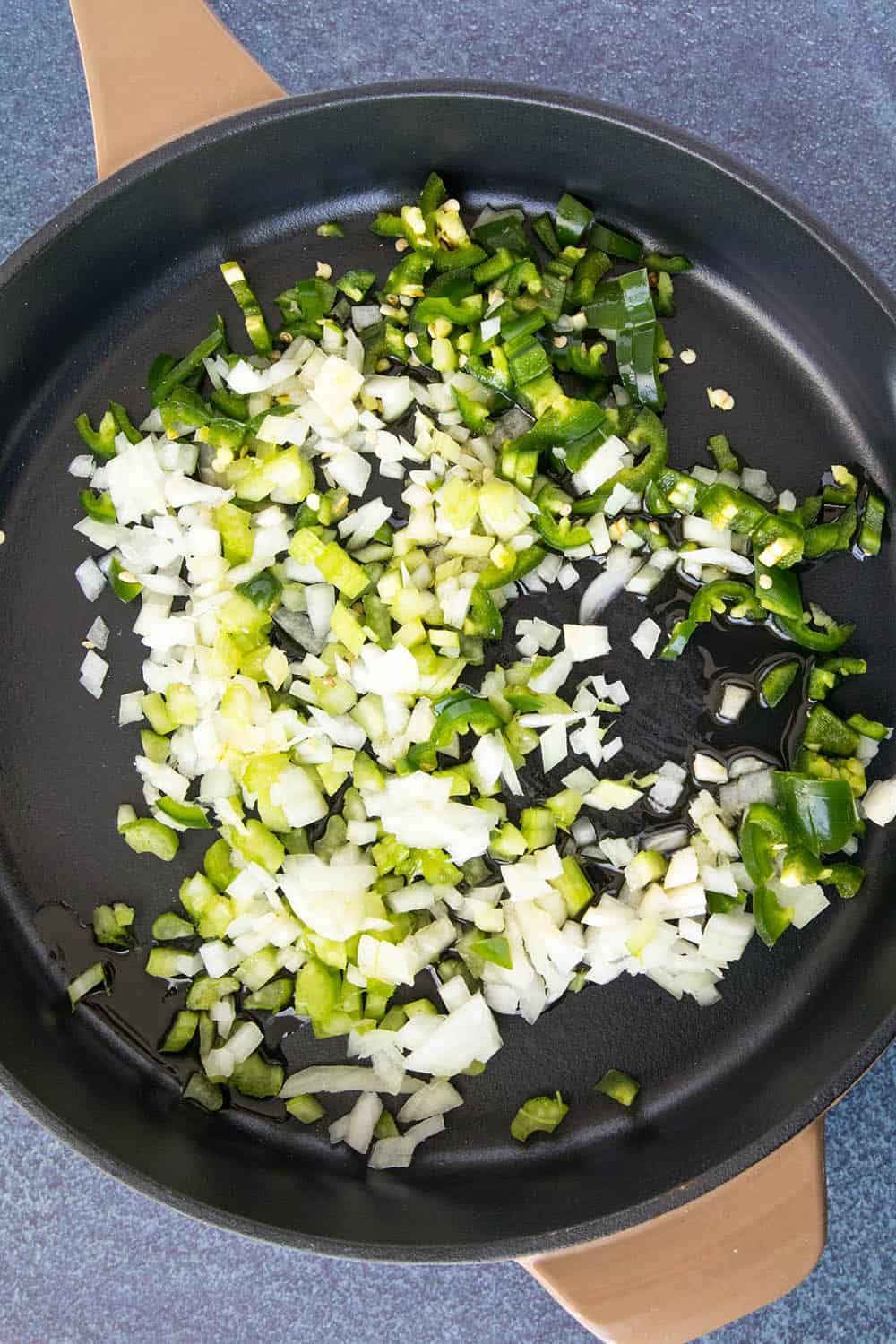 Cooking down the onions and peppers