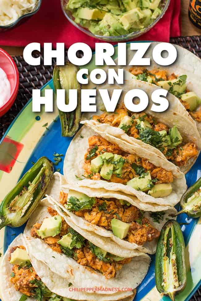 Chorizo con Huevos (Scrambled Eggs with Chorizo) Recipe - A spicy Mexican breakfast recipe, chorizo con huevos is made with Mexican chorizo and scrambled eggs served over warmed corn tortillas. #MexicanFood #SpicyBreakfast