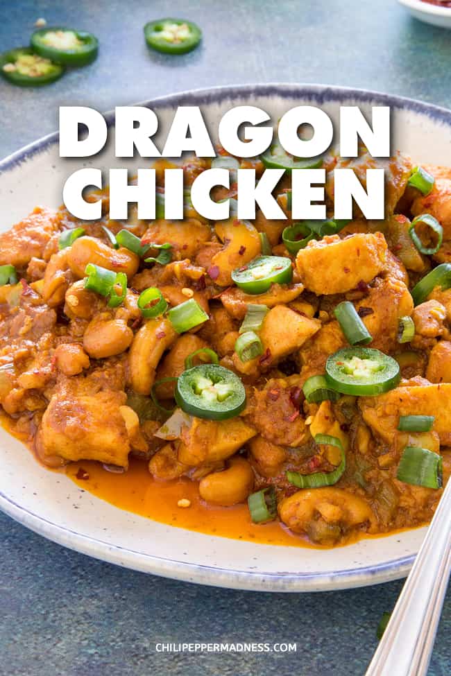 Dragon Chicken - This Chinese dragon chicken recipe is spicy marinated chicken that is lightly fried then sauteed with cashew nuts and peppers, served alone or with rice. #ChineseFood #ChickenDinner