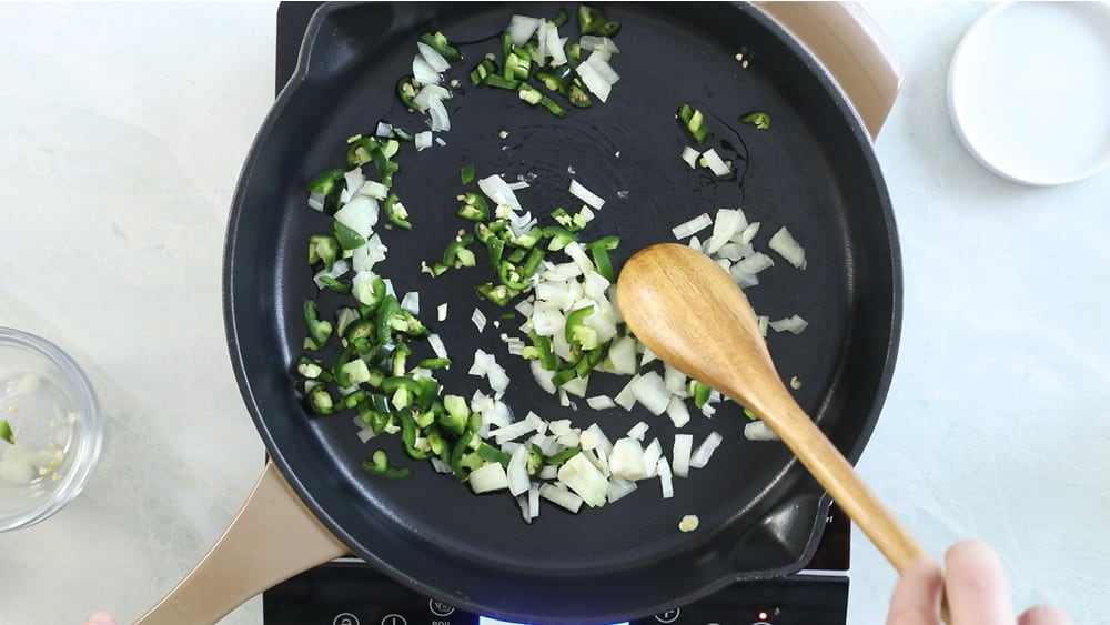 Cooking down onions and serrano peppers