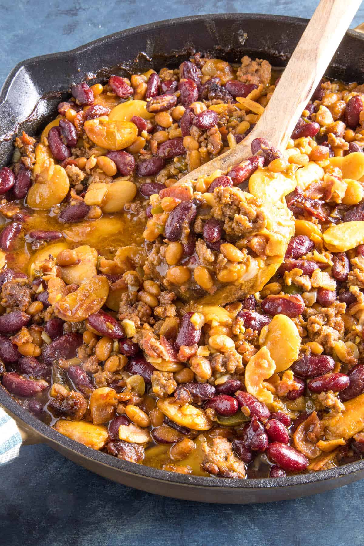 Cowboy Beans being served on a spoon.