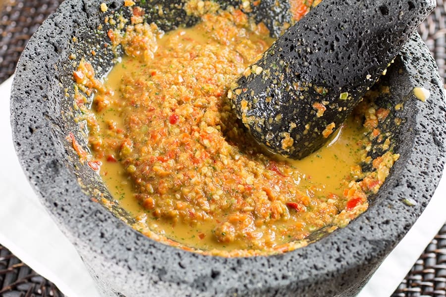 Habanero Chili Paste in a molcajete, being ground