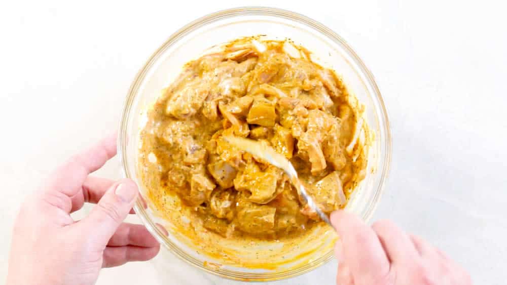 Stir the chicken with the thick butter chicken marinade